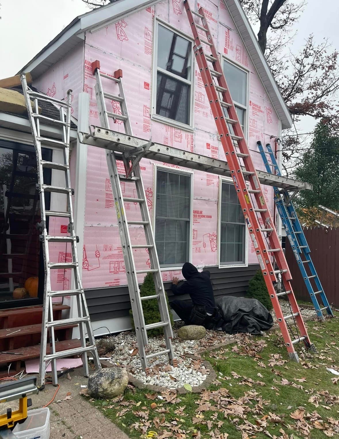 Foam-board sheathing before new siding