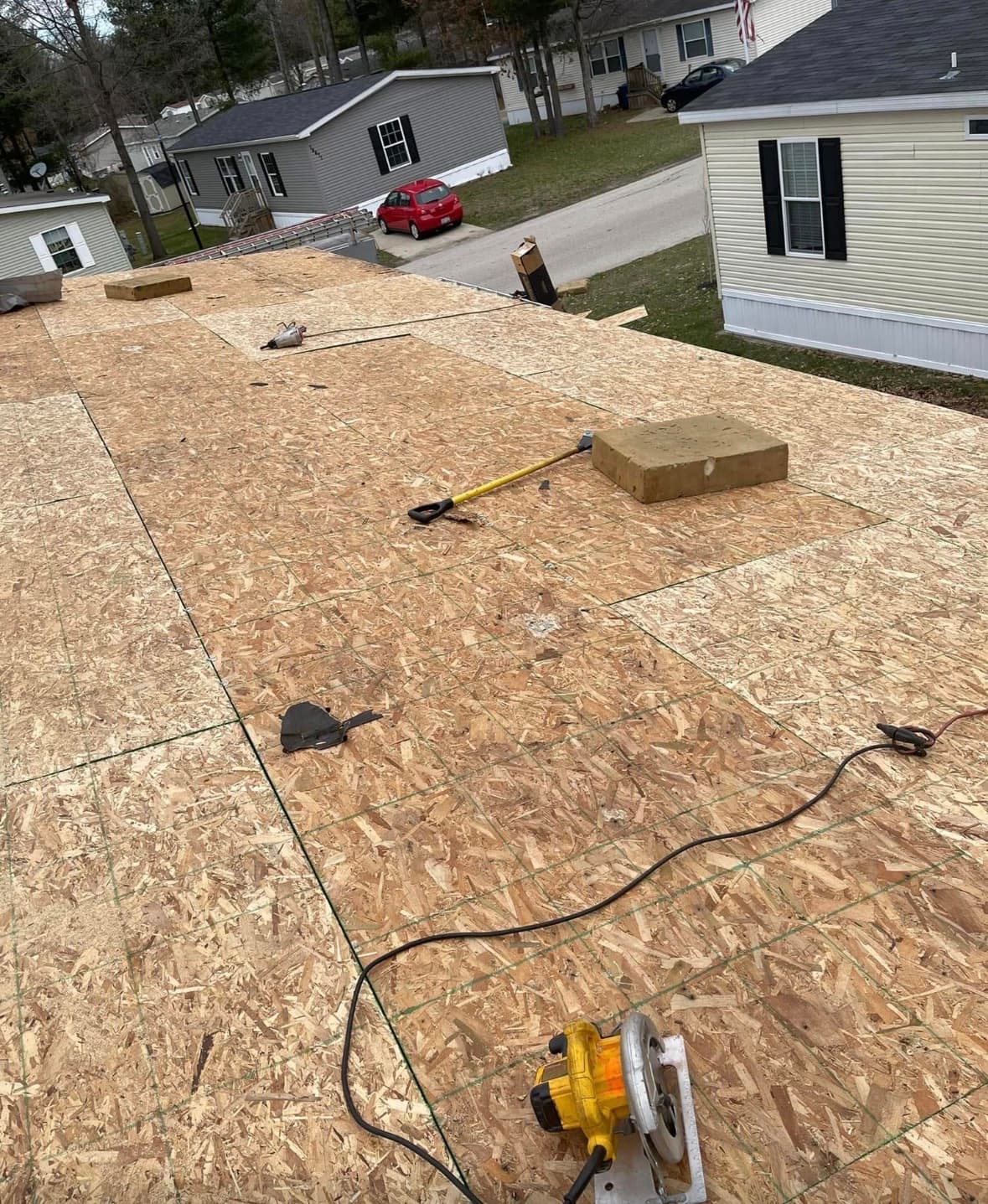 New roof decking installed on a manufactured home, before shingles
